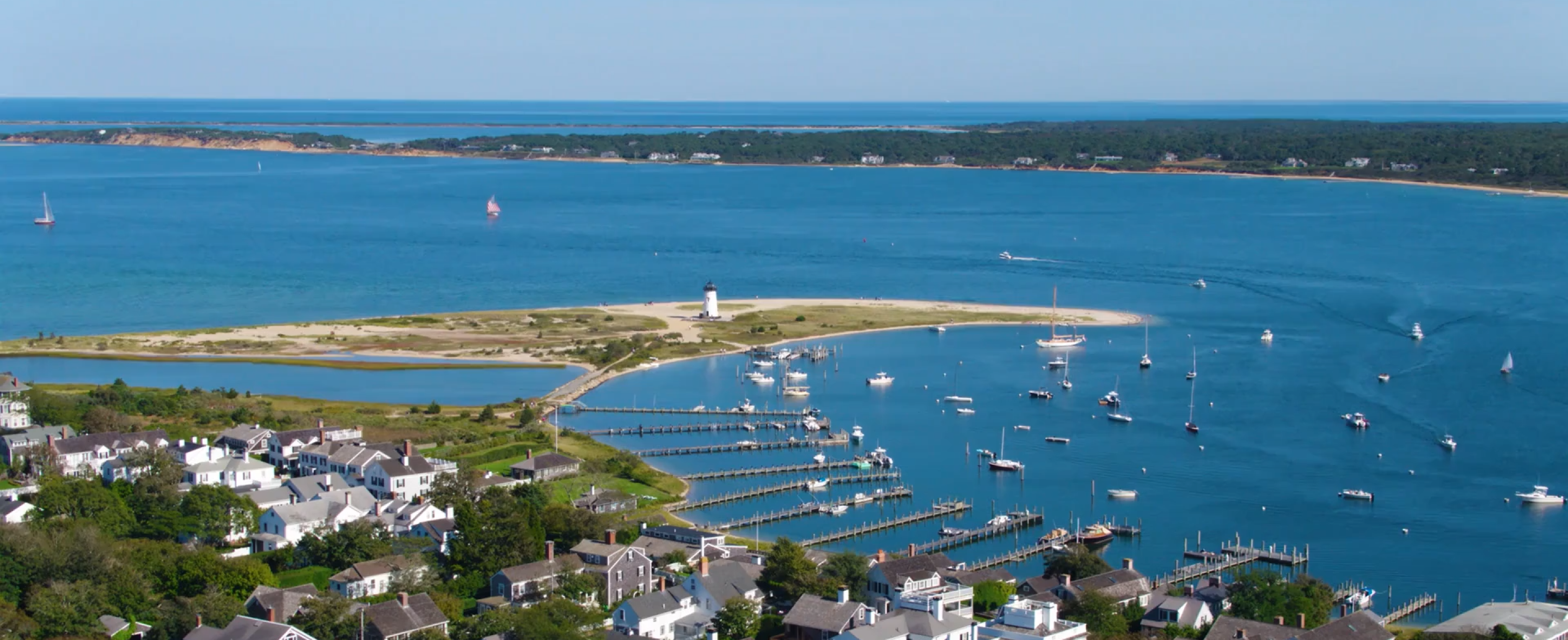 Drone aerial video of Edgartown harbor overlooking the lighthouse.